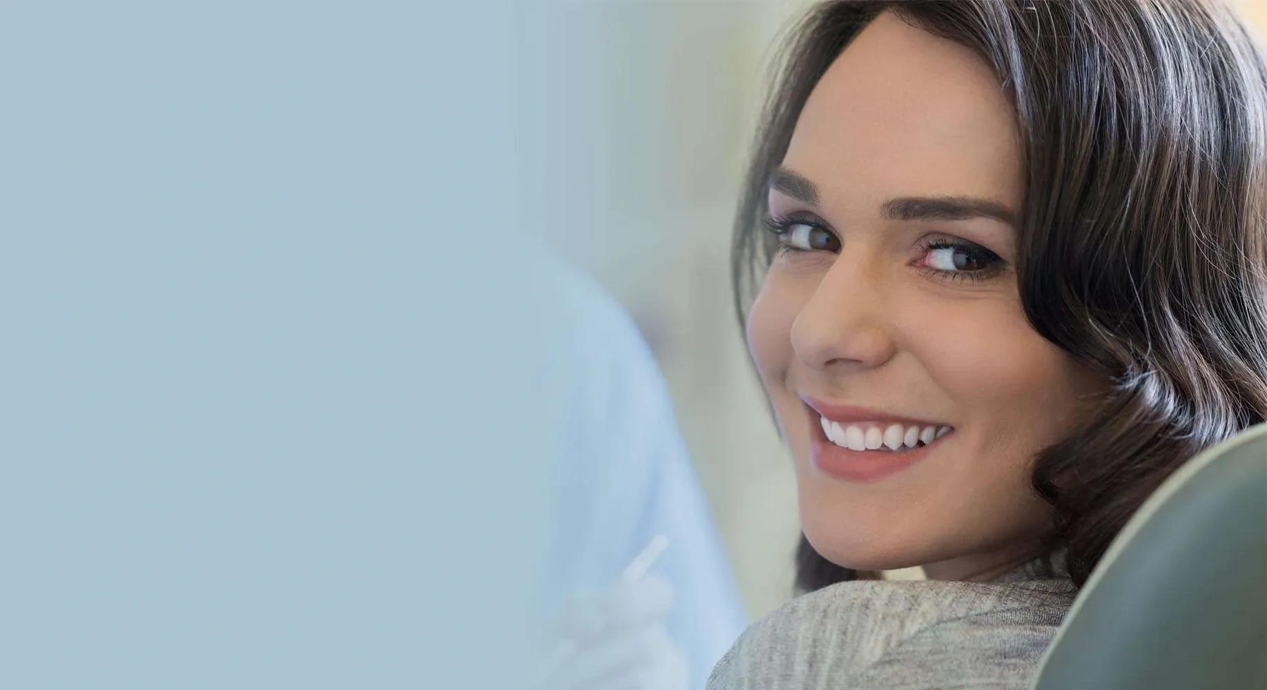 Smiling woman at a dental appointment